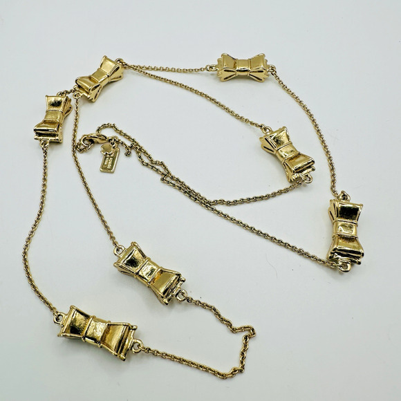 Kate Spade New York Take a Bow Long Gold Plated Necklace - Picture 1 of 7